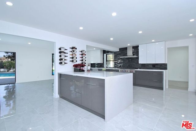 12112 Woodley Avenue, Granada Hills CA: https://media.crmls.org/mediaz/d5882dce-0f7f-4c76-a14d-af36e689b6f8.jpg