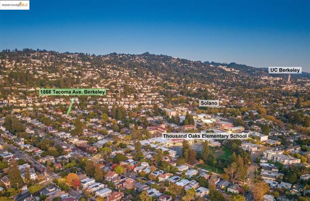 Aerial overview of property's location featuring mountains