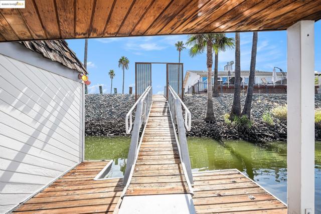 Dock featuring a water view