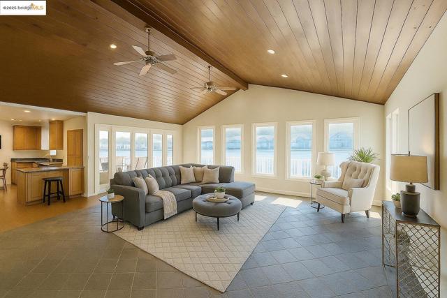 Living room featuring recessed lighting and wood ceiling