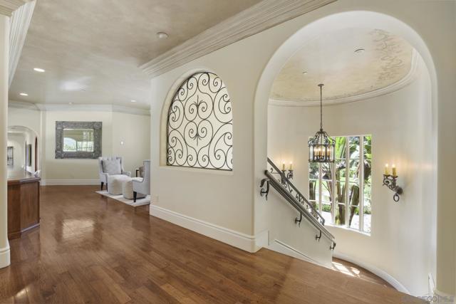 Gorgeous landing area upstairs with a nice seating area and a built in study desk