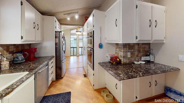 18218 Paradise Mountain Rd, Valley Center CA: https://media.crmls.org/mediaz/d6ef0dde-f7ed-49a0-99fa-fee250620152.jpg