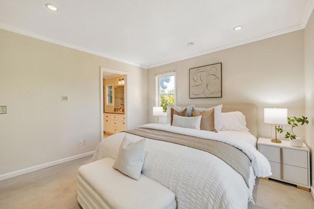 Primary Bedroom with Walk-In Closet and Ensuite Bathroom