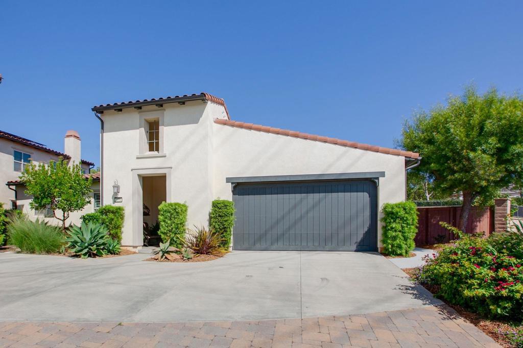 Stunning, FULLY FURNISHED, one-story home available for long-term lease in the desirable Aviara area, of Carlsbad, just 2 miles from the Pacific Ocean. This well-maintained, newer home boasts 3 bedrooms, 2 1/2 baths, and a 2-car garage. Spanning 1900 sq ft, the property features central heating and air conditioning, upscale Ethan Allen furniture, and high-end appliances including a gas stove.  The master and guest bedrooms are furnished with queen beds featuring Beautyrest Black mattresses, TVs, and ceiling fans, each with its own en-suite bathroom. The third bedroom is currently set up as a home office but can be converted to a bedroom to suit your needs. The living area offers a 60-inch TV with surround sound. The private backyard is a true oasis, featuring a gas BBQ island, a beautiful water feature, and an array of lush plants and fruit trees. The large sideyard provides an ocean view, an elevated gas fire pit, and a bubbling urn, creating a perfect space for outdoor entertaining.  Additional amenities include a grassy park across the street, a half bath, a laundry room, and quality bedding, pillows, linens, and towels. The property also provides beach chairs, umbrellas, beach towels, and boogie boards for tenant use. With hardwood floors throughout, carpeted secondary bedrooms, and wool rugs in the living area and master bedroom, this home is a truly luxurious and comfortable living space. The garage even features epoxy flooring.  The homeowner is open to terms but prefers a one-year lease, and the property can be available between November 15 and January 1st.