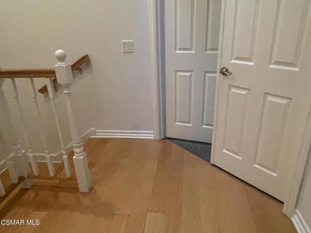 Wood floors and entr to mb