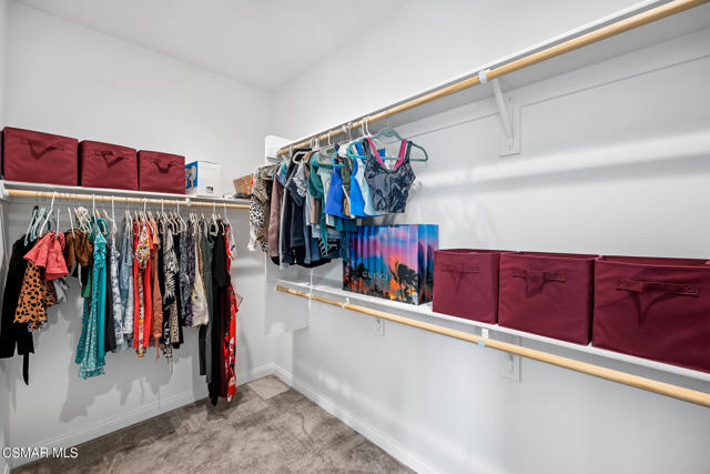 1 of 2 Primary Bed Walk-In Closets