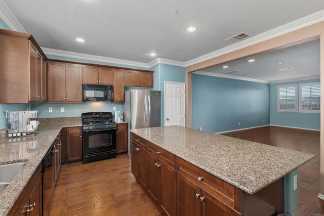 1605 Calabria Street, Santee CA: https://media.crmls.org/mediaz/d8e58f48-ac71-4f03-be46-893c79146316.jpg