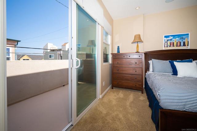Bedroom #3 - slider opens to private balcony on the back side that wraps around to the north side.