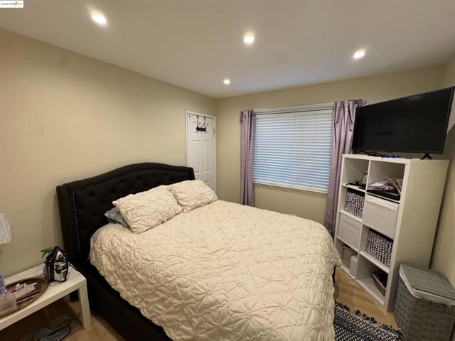 Bedroom featuring recessed lighting and light wood-type flooring