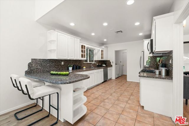 1220 N Norman Place, Los Angeles CA: https://media.crmls.org/mediaz/d9adba6b-8481-437e-93fa-a80ed02cf163.jpg