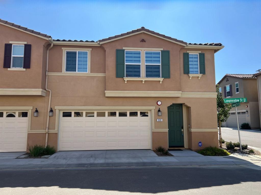 530 Longmeadow Street Vista, California Welcome to your new home in the highly desirable Silverado community in Vista! Available June 13th! This beautifully maintained smart-home is an end unit and offers a perfect blend of comfort, style, and convenience. Enjoy a generous living area with plenty of natural light, perfect for entertaining or relaxing with family. Three full bedrooms plus a large loft. Modern kitchen fully equipped with stainless steel LG appliances, induction stove, ample cabinet space, bar stool area, quartz counter tops and a cozy breakfast nook. Solar panels, dual pane windows, central A/C, ceiling fans, water softener, all hard-surface flooring. Primary suite features a walk-in closet and an ensuite bathroom with dual sinks and a soaking tub. A private backyard with a patio, ideal for outdoor dining and relaxation. The patio furniture and landscape maintenance are included. Laundry room upstairs with LG washer and dryer included. Attached 2-car garage with additional storage space, EV charging. As part of the Silverado Homeowners Association, residents enjoy access to a well-maintained dog park, playground, and an electric barbecue. Peaceful and friendly community close to schools, shopping centers, dining options, and easy access to major highways. Pets will be considered. Each pet is $100 additional rent per month. Don’t miss out on this fantastic rental opportunity in one of Vista’s most sought-after neighborhoods!