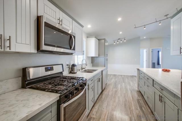 450 E Bradley Ave, El Cajon CA: https://media.crmls.org/mediaz/da41c46b-edad-4795-a55b-5400defdc27e.jpg