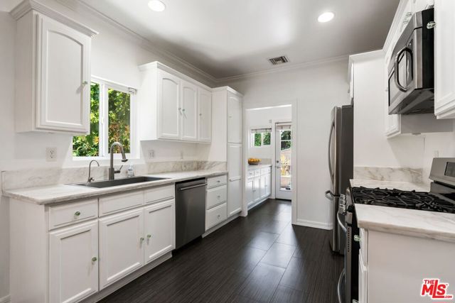 2130 W 27th Street, Los Angeles CA: https://media.crmls.org/mediaz/daab0e65-4527-4346-8937-2da0ccb2b82b.jpg