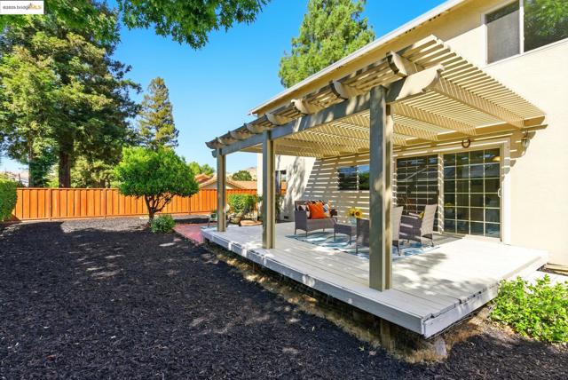 Wooden terrace with a pergola