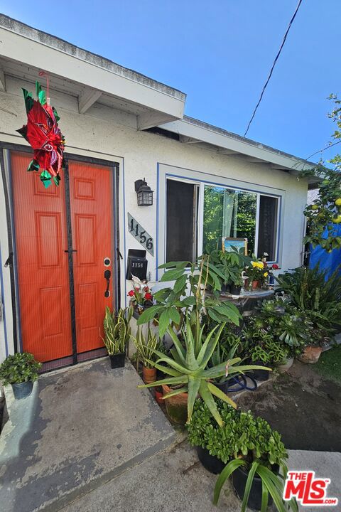 1158 E 77th Street, Los Angeles CA: https://media.crmls.org/mediaz/db66ed3b-1a7d-4ceb-8d7b-ee5da88cbcb9.jpg