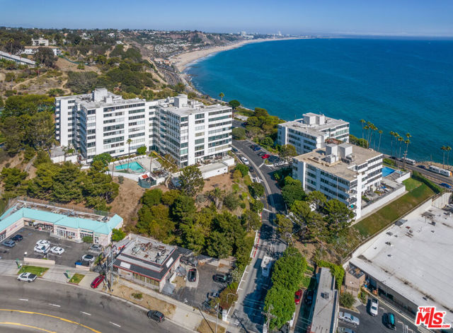 Enjoy breathtaking Ocean Views from every room in this Corner unit located in the desirable Pacific Palisades! Sweeping Panoramas of the bluffs and beaches, Sunrises over Santa Monica, Sunsets in Malibu, Catalina Island on the horizon, and the city lights of the Queens Necklace by night. Stunning and bright with abundant natural light and an open floor plan, this 3 bed plus two 3 bath is situated in the corner creating total privacy with 360 white water views from every room! The open kitchen has recently been remodeled and features a breakfast bar, The inviting living room is excellent for entertaining guests taking in the jetliner views, or relaxing with a nice glass of wine taking in the Surreal Sunset. Expansive master suite features an en suite bath with tub/shower, waking up to amazing Sunrises, taking in the incredible Ocean Views in this spacious master! The two guest suites feature private expansive views, perfect for a guest or home office. The 24 hour guard gated Edgewater Towers is on 9 lush acres, with two saltwater pools, basketball court, gym, amazing hiking trails, barbecue/picnic area, dog park, and tennis courts. Imagine living a 5-star lifestyle at the beach! This gorgeous condo is truly a gem, just steps to the beach, located around the corner from Pacific Palisades Village, Malibu Country Mart, and Santa Monica, truly encompassing a walkable beach lifestyle! HOA includes water, electricity, gas, and trash. Please email for all showing requests.