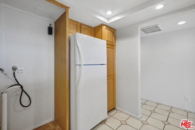 Kitchen with washer dryer hook