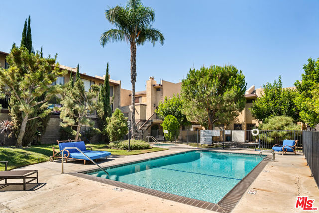 22038 Vanowen Street, Woodland Hills CA: https://media.crmls.org/mediaz/dc73aa4b-c674-4ef2-8b15-a896348fb488.jpg
