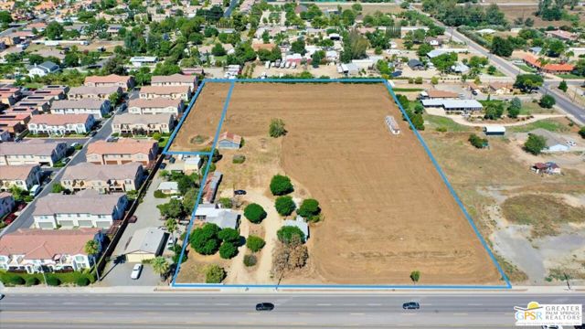 Excellent development opportunity in a prime location on 5.34 +/- acres of flat land.  Situated in the heart of the Murrieta Valley and offering 330 feet of paved street frontage along Washington Ave..  Perfectly situated for a large residential or commercial development.  Zoned neighborhood commercial allowing for retail, medical offices, some housing, schools and endless opportunities.  Adjacent to this parcel is a 7' Eleven development with a 8-16 pumps gas station/store on the corner of Washington Ave. and Lemon Ave.  Other Neighboring developments on Washington Ave. and Magnolia include a brand new McDonald's, Car Wash and Gas Station.  All utilities and infrastructure already in place with two houses on the premises that are currently leased on a month to month basis.  Two parcels being sold together.  APN 906-780-035 includes 4.70 +/- acres at 24264 and 24280 Washington Ave. and APN 906-780-037 includes .64 +/- acres.  Please do not disturb tenants.  Buyers to verify all information before COE.
