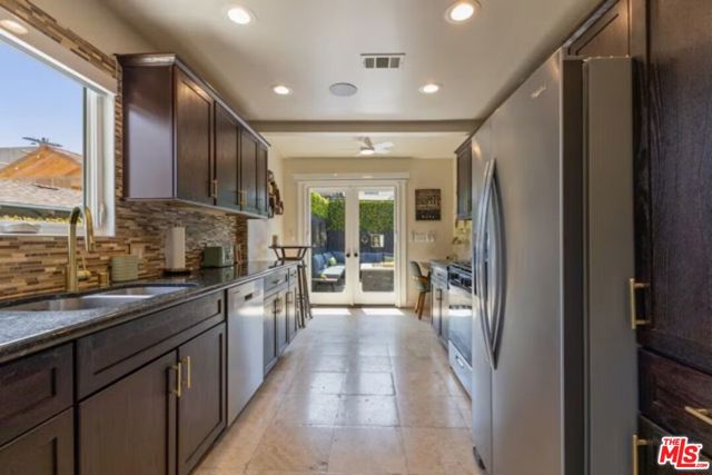 725 N Harvard Boulevard, Los Angeles CA: https://media.crmls.org/mediaz/ddf980c3-ecd7-4d06-a11d-ca604db0384e.jpg