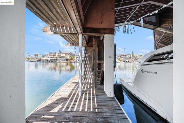 Dock featuring a water view