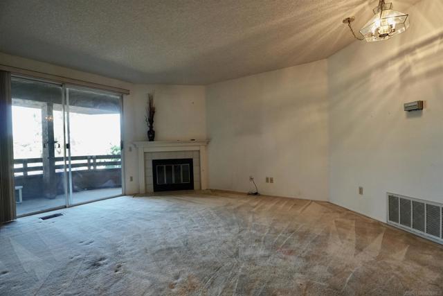 Combo living and dining area with fireplace