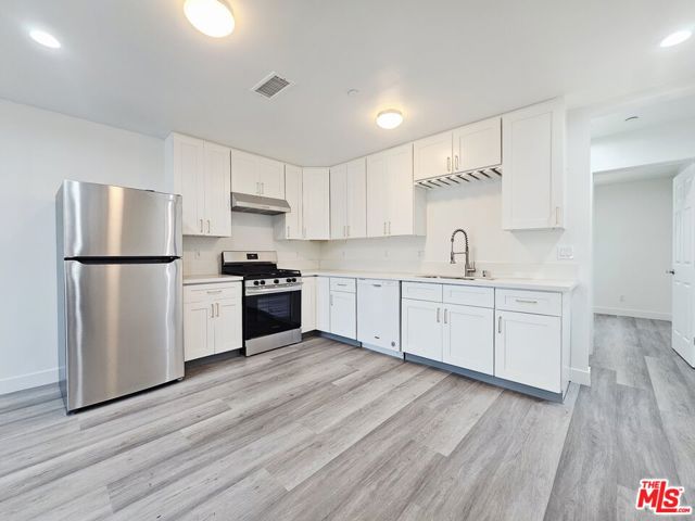 4110 S Normandie Avenue, Los Angeles CA: https://media.crmls.org/mediaz/df65a579-bf7c-4709-a344-78602852500f.jpg