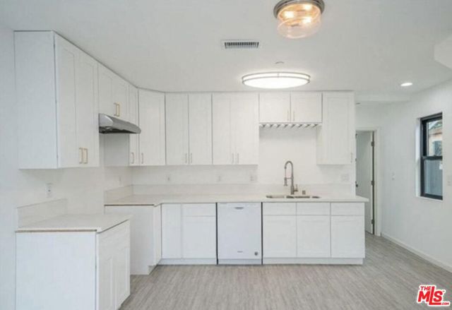4110 1/2 S Normandie Avenue, Los Angeles CA: https://media.crmls.org/mediaz/dfc2e406-acc8-4e49-a8a9-01a5e60b3673.jpg