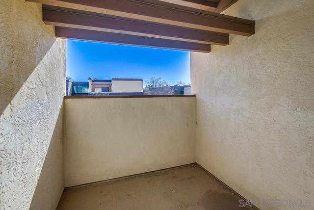 This patio area has been enclosed on other townhomes in this complex to add another room.