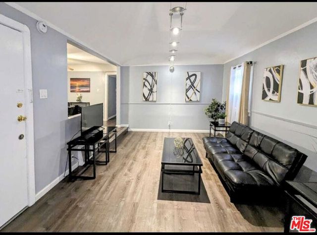 606 N Alta Vista Boulevard, Los Angeles CA: https://media.crmls.org/mediaz/dfe3256e-8556-44a9-a418-8a710f34cb06.jpg