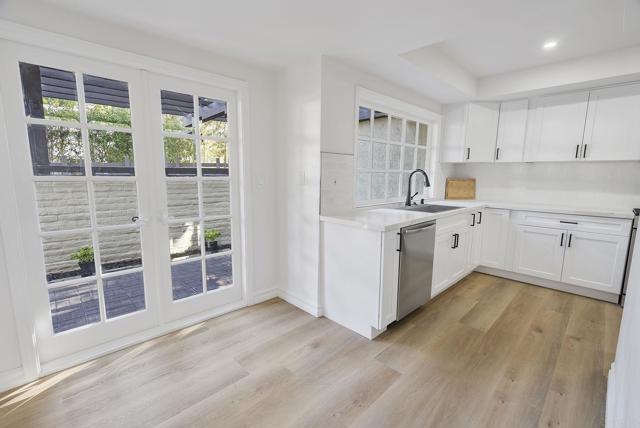 Breakfast Nook/Eat In! Lovely French Doors that lead to Entertaining Patio! FAB Natural Light!