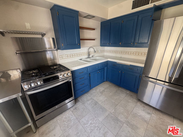8218 De Longpre Avenue, West Hollywood CA: https://media.crmls.org/mediaz/e068c846-30b2-491c-afe5-3099227ce2d7.jpg