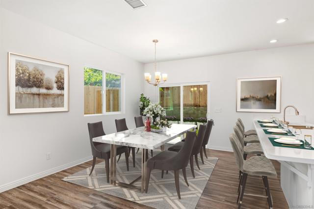 Virtually Staged large dining area.  Very large and near the kitchen