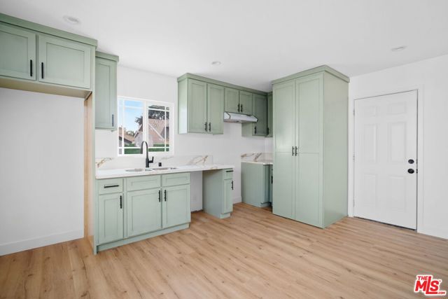 1050 W 48th Street, Los Angeles CA: https://media.crmls.org/mediaz/e0cf4320-0fef-48c3-9ebf-9ba152c82f6f.jpg