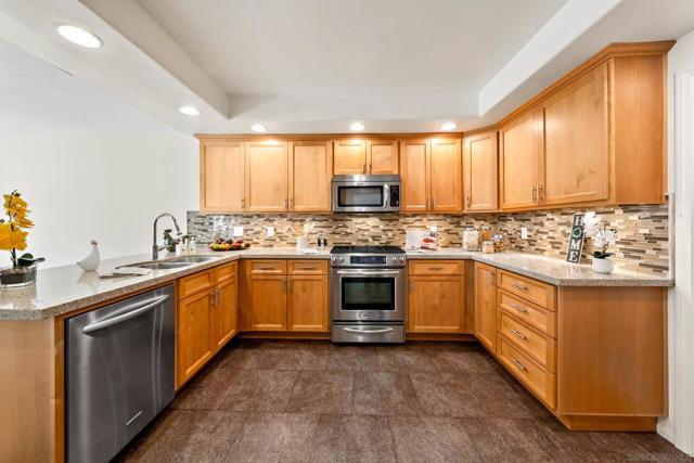 Soft under-cabinet lighting sets the mood of the kitchen