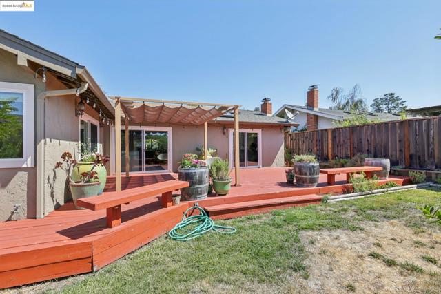 Wooden deck featuring a pergola