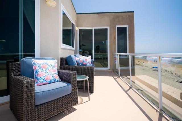 Slider off the master bedroom walks out to the ocean front deck!