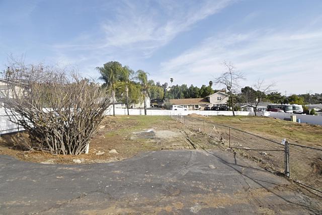 LARGE GATED DRIVEWAY TO FULLY FENCED LOWER LOT