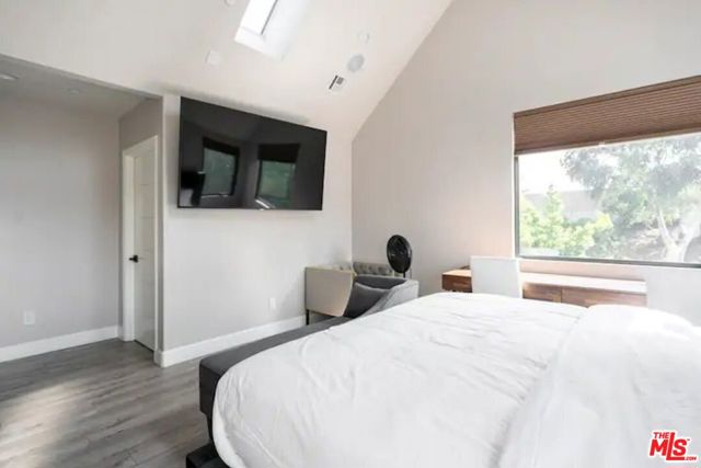 Bedroom #5 also has a chair and work space area.