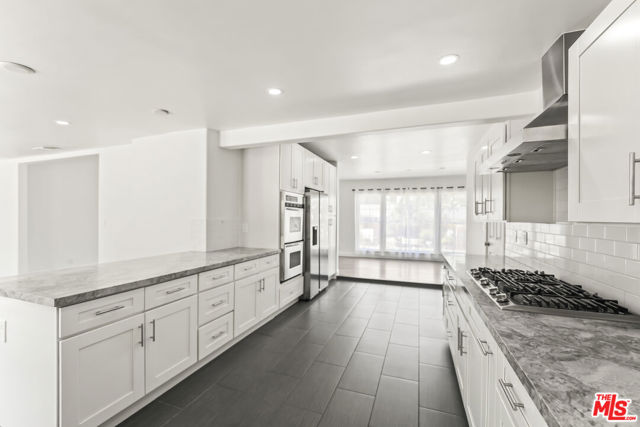 23046 Leonora Drive, Woodland Hills CA: https://media.crmls.org/mediaz/e2064cca-d75d-4ff6-b68c-e1e29414fc57.jpg
