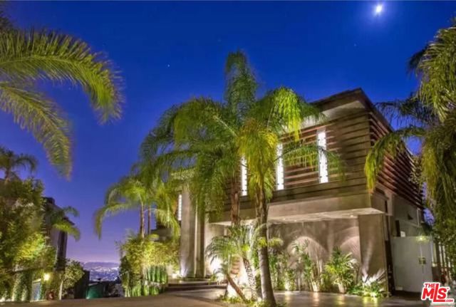 1764 Viewmont Drive Los Angeles, California Available for short or long term lease. Masterpiece-of-art contemporary home in a private, gated enclave of only 6 homes sits above the Sunset Strip, featuring walls of glass with views from city to the ocean. 4 Bedrooms, 5 baths including a primary suite with closets for a fashionista, and a bath like a 5 star hotel. Gourmet, chef's kitchen with the finest stainless-steel appliances, movie theater, gym area, infinity pool and spa. This home has it all. Proudly offered at $6,950,000