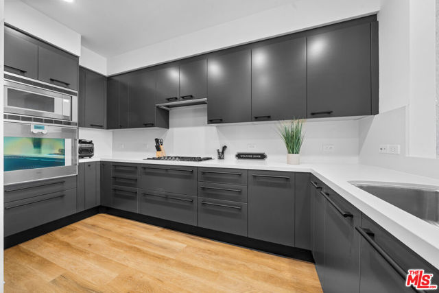 900 W Olympic Boulevard, Los Angeles CA: https://media.crmls.org/mediaz/e2ab8b7c-220f-46e1-8aca-d32ee5a29d97.jpg