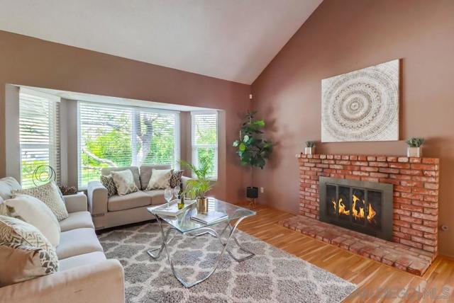 Oversized front windows and cozy gas fireplace!