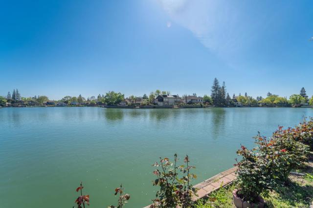 Beautiful & tranquil lake views from the patio & backyard. The 1st floor primary bedroom view! Wow!