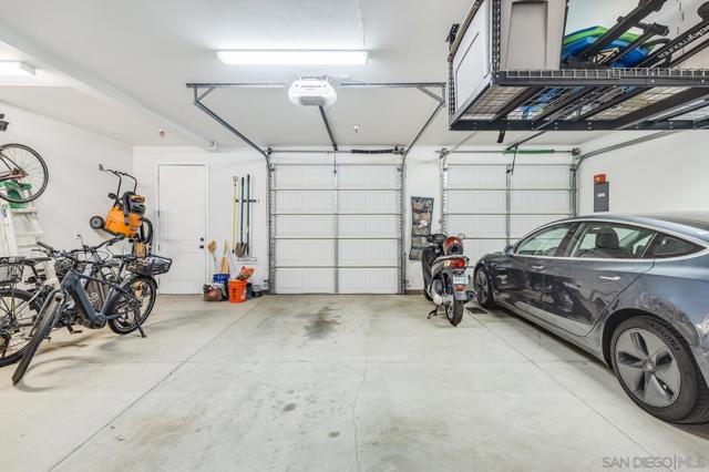 2 car + garage.  Loads of storage and a separate entrance door for easy access to the First Floor Room.