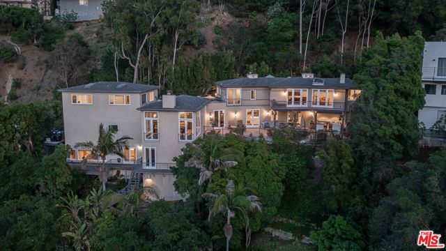 9430 Readcrest Drive Beverly Hills, California An incredible opportunity to own this home surrounded by other homes that are $10M to $30M. An incredible offer of seller finance for up to $4 million for one year with a 7.5% interest-rate, which gives you a great opportunity to flip this home. Nestled within the hills of Coldwater Canyon, sitting upon 10,450 sqft of land, you will find this glamorous Beverly Hills home. Approximately 150' frontage. The Elegance and attention to detail is seen throughout its 6 BD, 5 Baths & 2 powder rooms. A garage that provides more than enough room for 2 cars. Formal living room, and a classic formal dining room with soaring high ceiling's. Along with french door's that open out to a tranquil setting accompanied by an incredible view that can be seen from every corner of the house. Take a short walk down the stairs located on the backside of the house to encounter a wine cellar large enough to fit 1,500 bottles of your favorite wine. The large master bedroom features a sitting area that offers a cozy balcony, high above the lush landscaping of the backyard. The Chef's Kitchen consist's of all Viking appliances, a large french marble countertop Island, and custom cabinetry. Step outside onto the outdoor patio area, where you will find a built in bar and stove for bbq. Perfect for entertaining guests, or any large parties. There is so much to see in this beautiful property, making it an absolute must show. Close to West Hollywood Elementary, Emeson Community Charter & University Senior High school Charter.