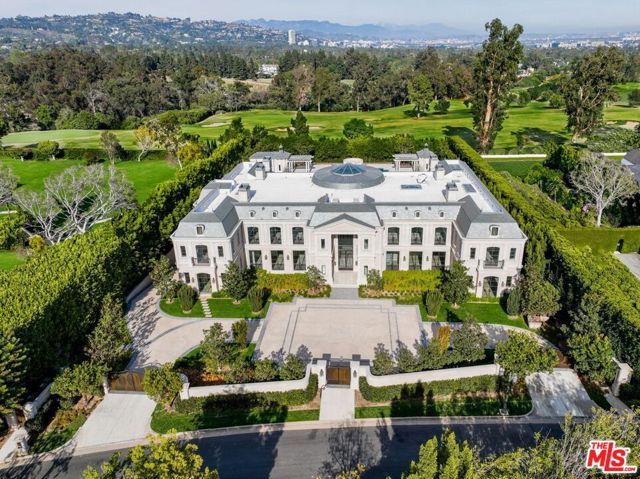 Spread with historic trophy estates and some of the most ethereal compounds in the city, Holmby Hills is without a doubt one the most exclusive neighborhoods in Los Angeles. This Estate was designed by Richard Landry and is a truly Unique Opportunity.  Approximately 35k sq.ft. of immaculate architecture, manicured landscaping, and your chance to completely customize the interiors. Enter through the gates and  motor court to the Grand Entry to create what you have dreamed of on over three levels of living and entertaiment space. Complete with a finished pool & changing cabana, your palatial Holmby Hills Estate awaits only your imagination to create ultimate luxury & boundless comfort.  Nothing compares to this Unique Opportunity.