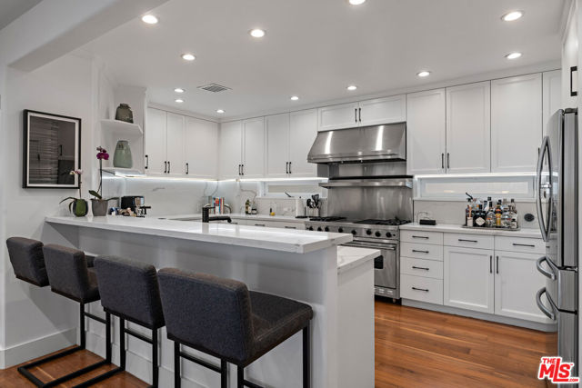 8701 Wonderland Park Avenue, Los Angeles CA: https://media.crmls.org/mediaz/e44b5b66-3c75-4d05-b3b6-3a0ca788d317.jpg