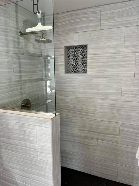 Outdoor bathroom attached to garage