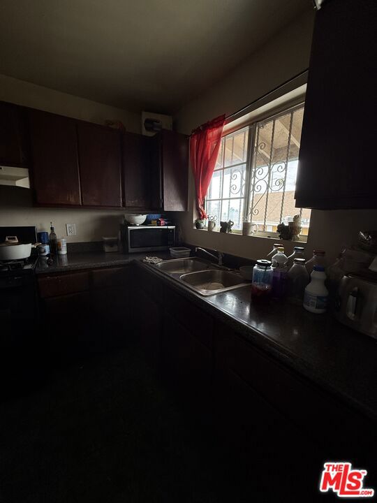 8307 S Figueroa Street, Los Angeles CA: https://media.crmls.org/mediaz/e4c51a3e-0072-469a-91d8-176703e726c9.jpg